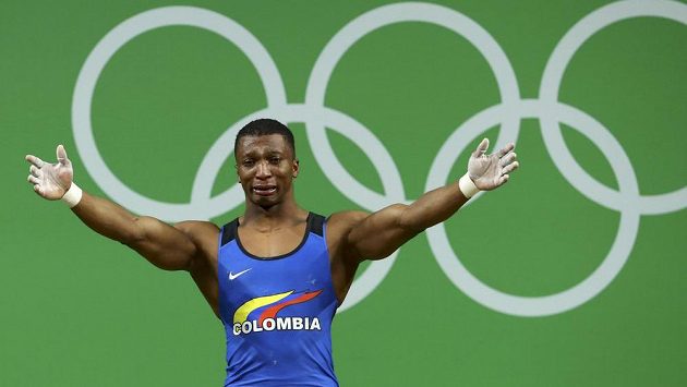Kolumbijský vzpěrač Óscar Figueroa se raduje z olympijského vítězství v kategorii do 62 kg. Kolumbijský vzpěrač Óscar Figueroa se raduje z olympijského vítězství v kategorii do 62 kg.