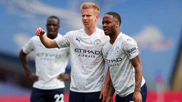 Fotbalisté Manchesteru City během utkání Premier League. Fotbalisté Manchesteru City během utkání Premier League.