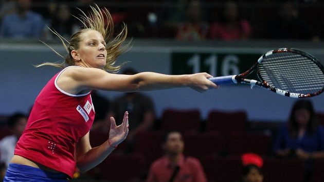 Česká tenistka Karolína Plíšková na snímku z exhibiční ligy IPTL v Singapuru. Česká tenistka Karolína Plíšková na snímku z exhibiční ligy IPTL v Singapuru.