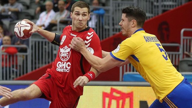 Házenkář Tomáš Babák v zápase MS proti Švédsku. Házenkář Tomáš Babák v zápase MS proti Švédsku.