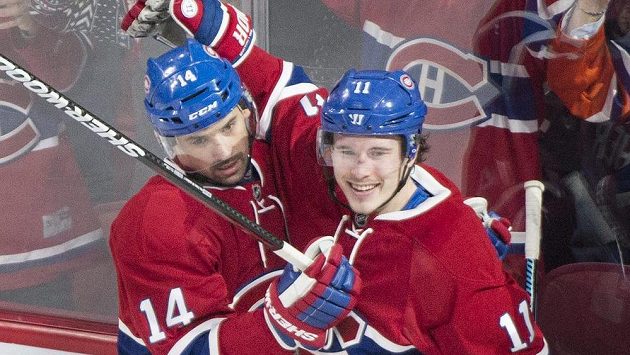Tomáš Plekanec (vlevo) z Montrealu slaví gól proti Edmontonu se spoluhráčem Brendanem Gallagherem. Tomáš Plekanec (vlevo) z Montrealu slaví gól proti Edmontonu se spoluhráčem Brendanem Gallagherem.