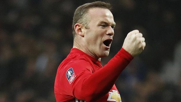 Wayne Rooney oslavuje gól. Wayne Rooney oslavuje gól.