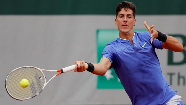Australský tenista Thanasi Kokkinakis během 1. kola French Open. Australský tenista Thanasi Kokkinakis během 1. kola French Open.
