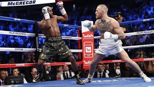 Floyd Mayweather a Conor McGregor, historický zápas boxera a bojovníka MMA. Floyd Mayweather a Conor McGregor, historický zápas boxera a bojovníka MMA.