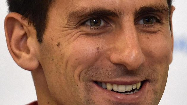 Rozesmátý srbský tenista Novak Djokovič Rozesmátý srbský tenista Novak Djokovič