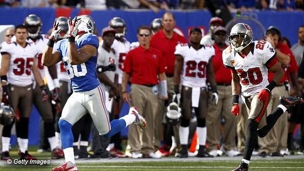 Victor Cruz zachytává touchdownovou přihrávku od Eliho Manninga Victor Cruz zachytává touchdownovou přihrávku od Eliho Manninga