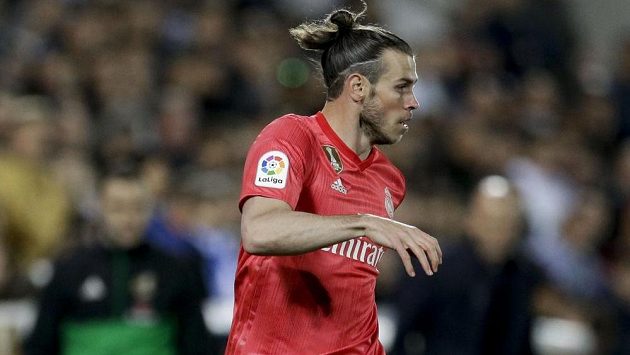Fotbalista Gareth Bale v akci v dresu Realu Madrid. Fotbalista Gareth Bale v akci v dresu Realu Madrid.