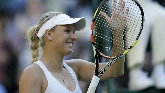Caroline Wozniacká na letošním Wimbledonu. Caroline Wozniacká na letošním Wimbledonu.