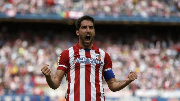 Fotbalista Atlétika Madrid Raul Garcia slaví gól proti Villarealu. Fotbalista Atlétika Madrid Raul Garcia slaví gól proti Villarealu.