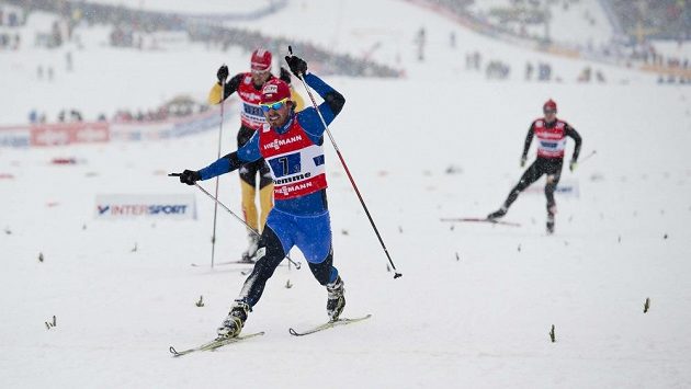 Český běžec na lyžích Aleš Razým (v popředí). Český běžec na lyžích Aleš Razým (v popředí).