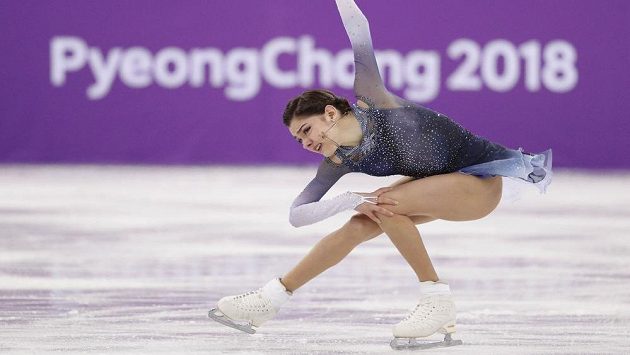 Krasobruslařka Jevgenija Medveděvová v týmové soutěži na ZOH během krátkého programu. Krasobruslařka Jevgenija Medveděvová v týmové soutěži na ZOH během krátkého programu.
