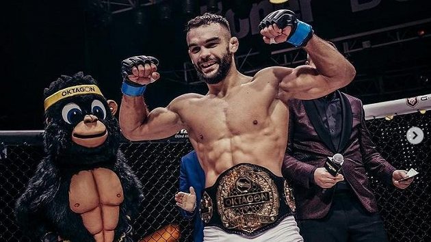 Ivan Buchinger získal mistrovský pás v lehké váze na turnaji OKTAGON 21. Ivan Buchinger získal mistrovský pás v lehké váze na turnaji OKTAGON 21.