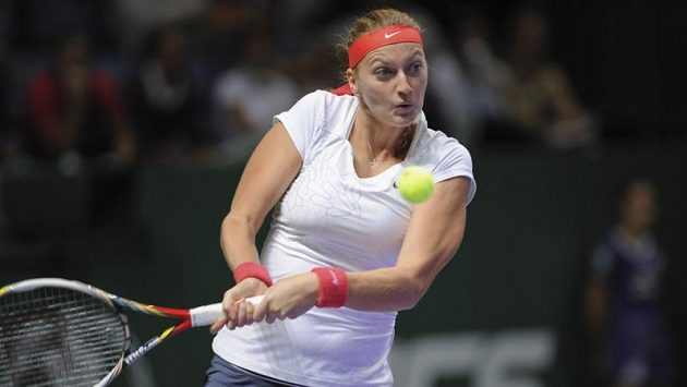 Petra Kvitová během úvodního zápasu na Turnaji mistryň proti Polce Radwaňské. Petra Kvitová během úvodního zápasu na Turnaji mistryň proti Polce Radwaňské.