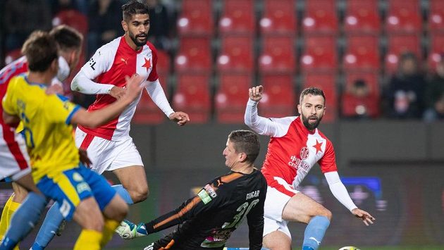 Josef Hušbauer ze Slavie a brankář Teplic Tomáš Grigar. Slávista možná zamíří do Liberce. Josef Hušbauer ze Slavie a brankář Teplic Tomáš Grigar. Slávista možná zamíří do Liberce.