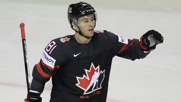 Kanadský hokejista Jonathan Marchessault slaví poté, co dal gól v utkání mistrovství světa. Kanadský hokejista Jonathan Marchessault slaví poté, co dal gól v utkání mistrovství světa.