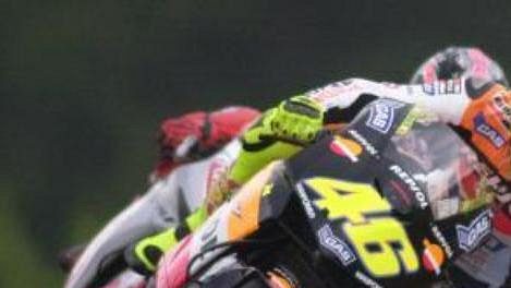 Ital Valentino Rossi na stroji Honda při první tréninkové jízdě třídy MotoGP Ital Valentino Rossi na stroji Honda při první tréninkové jízdě třídy MotoGP