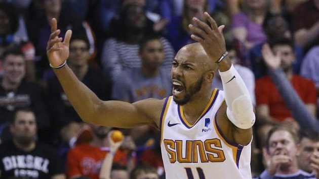 Basketbalista Phoenixu Suns Jevon Carter během utkání NBA s týmem Philadelphia 76ers. Basketbalista Phoenixu Suns Jevon Carter během utkání NBA s týmem Philadelphia 76ers.