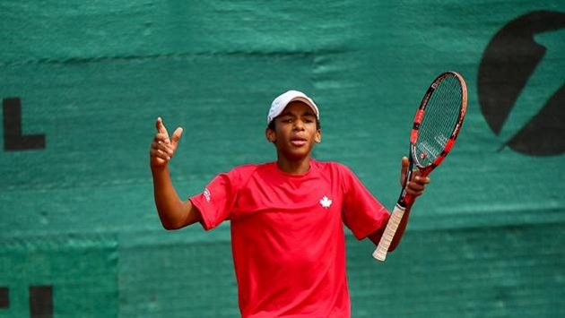 Čtrnáctiletý kanadský tenista Félix Auger-Aliassime. Čtrnáctiletý kanadský tenista Félix Auger-Aliassime.