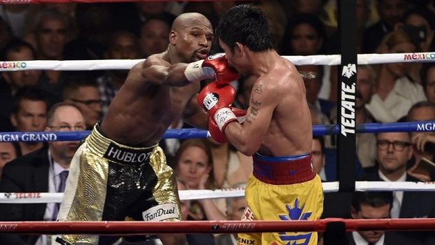 Floyd Mayweather (vlevo) v květnovém utkání s Filipíncem Mannym Pacquiaem v Las Vegas. Floyd Mayweather (vlevo) v květnovém utkání s Filipíncem Mannym Pacquiaem v Las Vegas.
