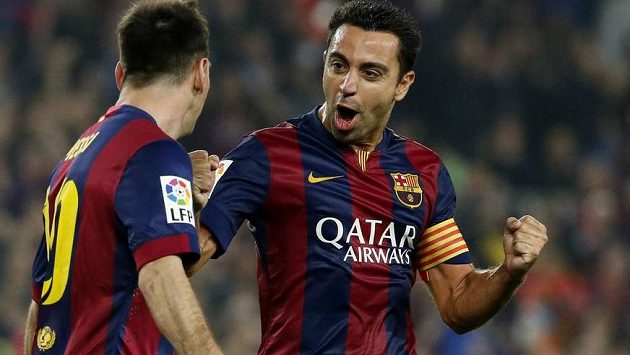 Hvězdy Barcelony - kapitán týmu Xavi Hernández (vpravo) a střelec Lionel Messi - slaví gól proti Seville. Hvězdy Barcelony - kapitán týmu Xavi Hernández (vpravo) a střelec Lionel Messi - slaví gól proti Seville.