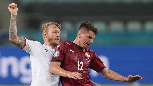 Dán Simon Kjaer (vlevo) a Lukáš Masopust. Dán Simon Kjaer (vlevo) a Lukáš Masopust.