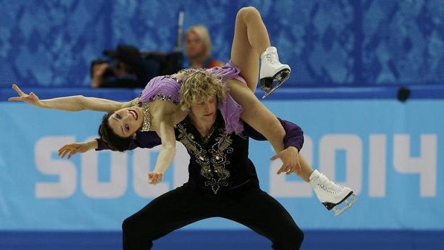 Američané Meryl Davisová a Charlie White získali olympijské zlato v tancích na ledě. Američané Meryl Davisová a Charlie White získali olympijské zlato v tancích na ledě.