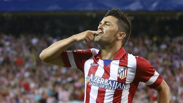 Útočník Atlétika Madrid David Villa slaví svůj gól v prvním utkání španělského Superpoháru proti Barceloně. Útočník Atlétika Madrid David Villa slaví svůj gól v prvním utkání španělského Superpoháru proti Barceloně.