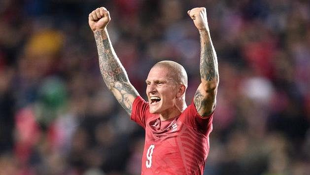 Český útočník Zdeněk Ondrášek oslavuje gól Český útočník Zdeněk Ondrášek oslavuje gól