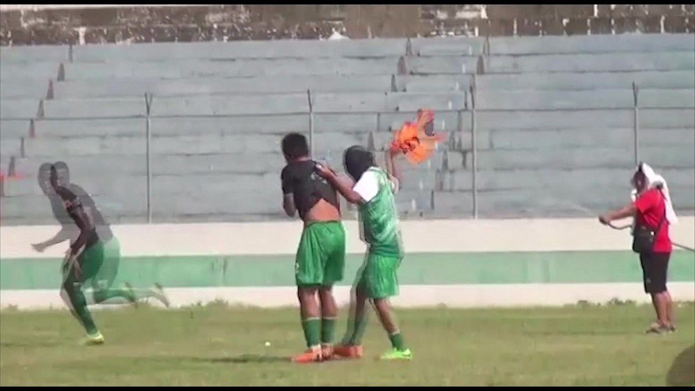 Invasion!  Uninvited visitors attacked the footballers directly on the field